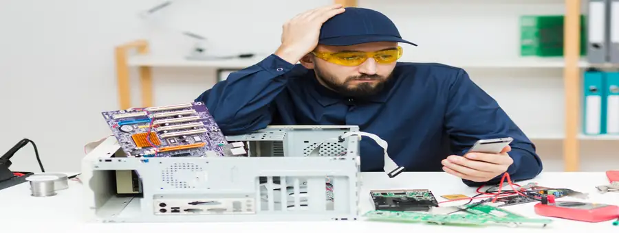 Technician performing advanced board-level repair